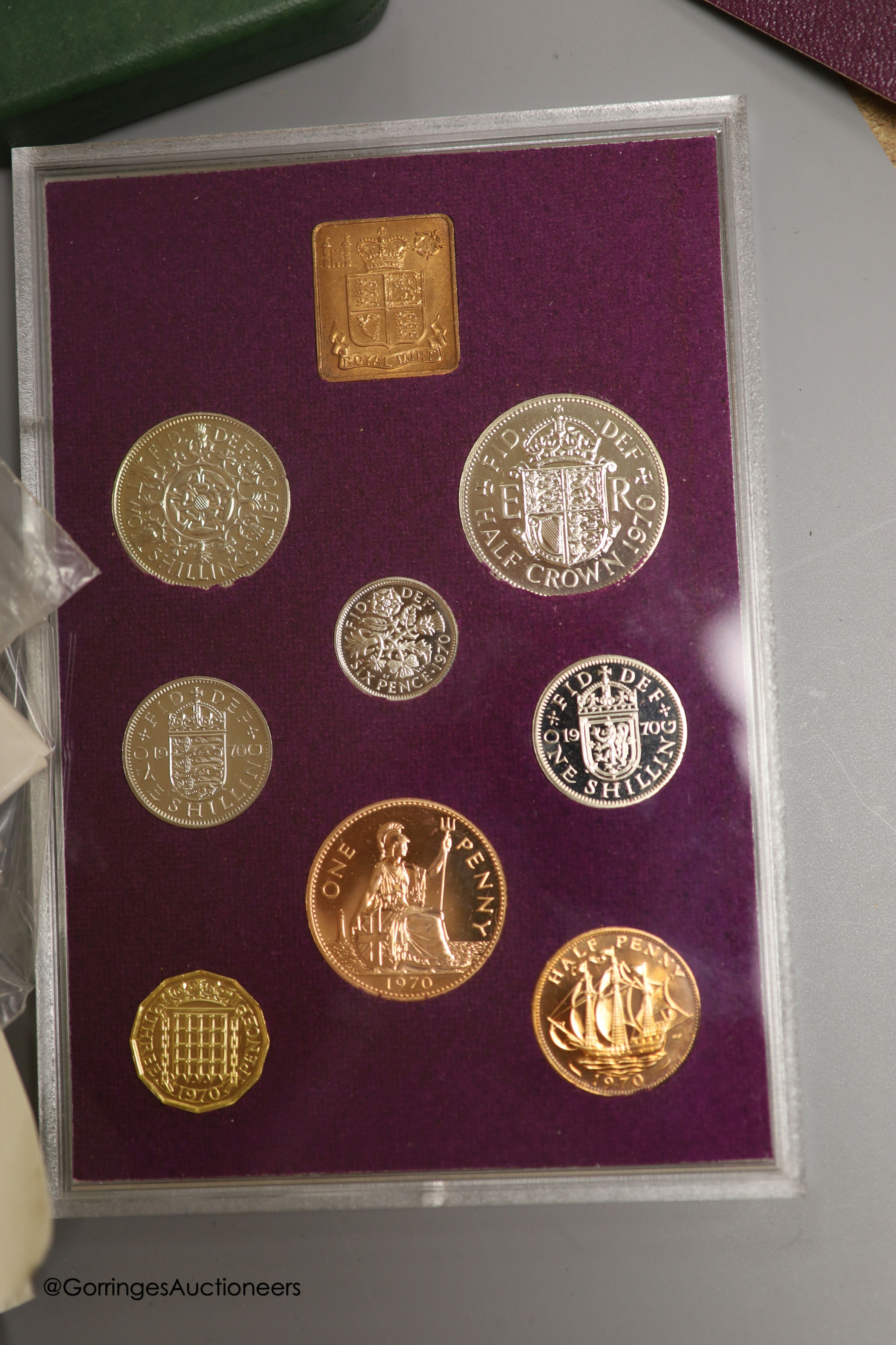 A collection of mostly Royal Mint UK commemorative coins and cover and five UK Brilliant Uncirculated coin collections for 1984 x2, 1986 x2 and 1987.